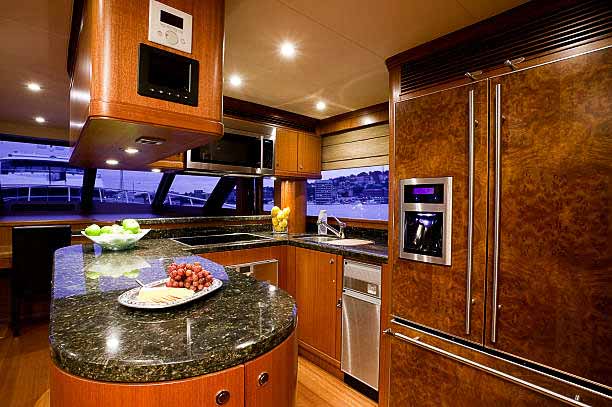 yacht galley kitchen with lightweight granite countertops