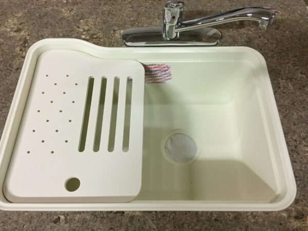 Under‑surface cutting board with right or left slots and drain holes – versatile kitchen accessory