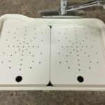 under surface cutting board right or left drain holes
