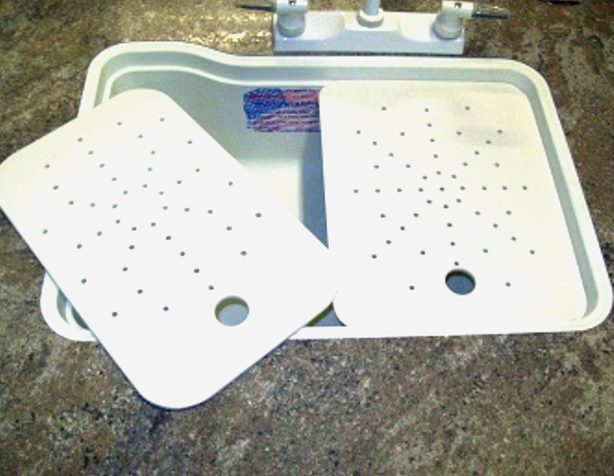 Under-surface cutting board with right or left drain holes – versatile kitchen accessory