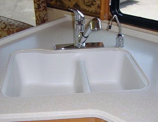Solid surface RV bathroom sink for camper and travel trailer